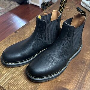 Dr. Martens Black Leather Boots with Yellow Accents